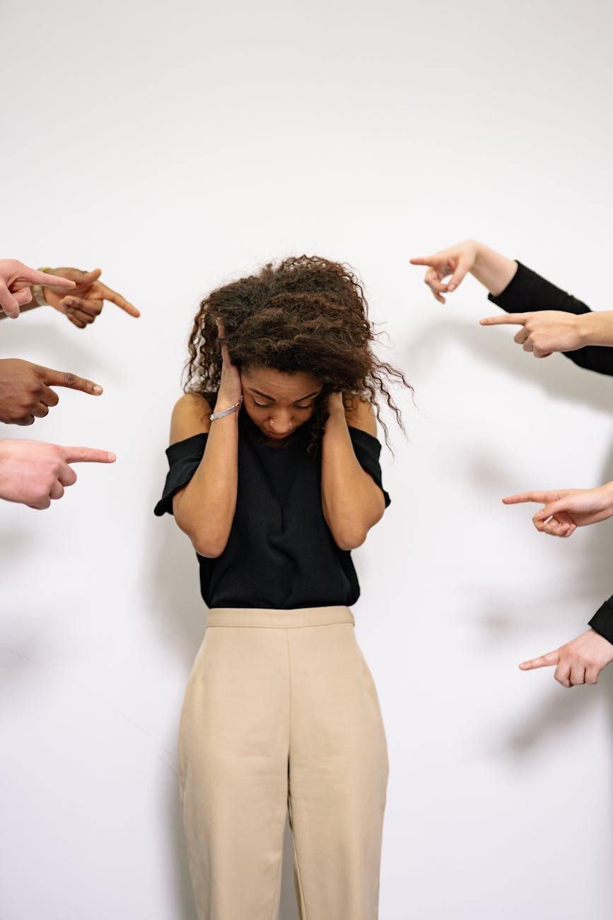 a woman being bullied by people